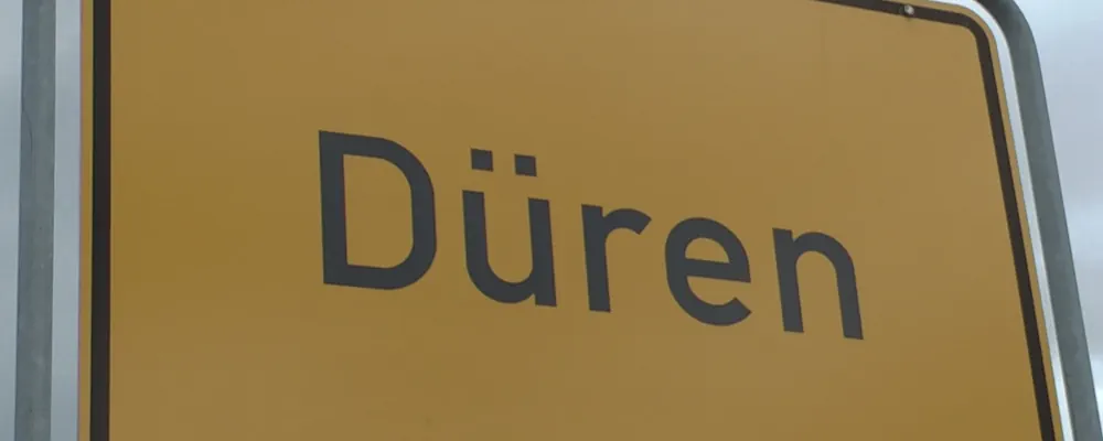 Ortseingangsschild von Düren als Symbol für die Ermittlungen der Condor Detektive in Düren.